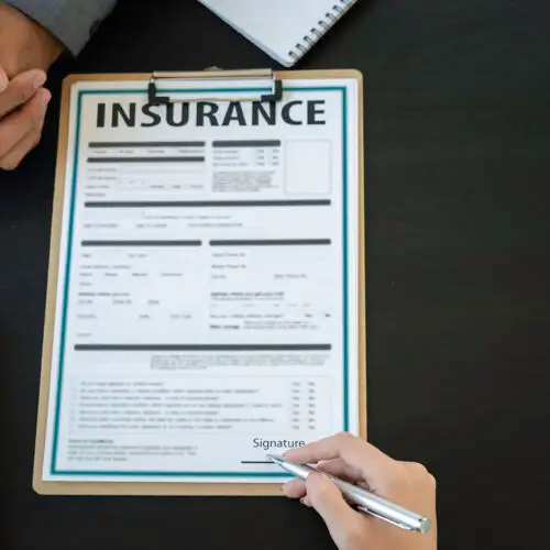 Male insurance agents are giving advice and signing a contract. In terms of insurance such as home, car, condo and health, various insurance ideas for modern life.